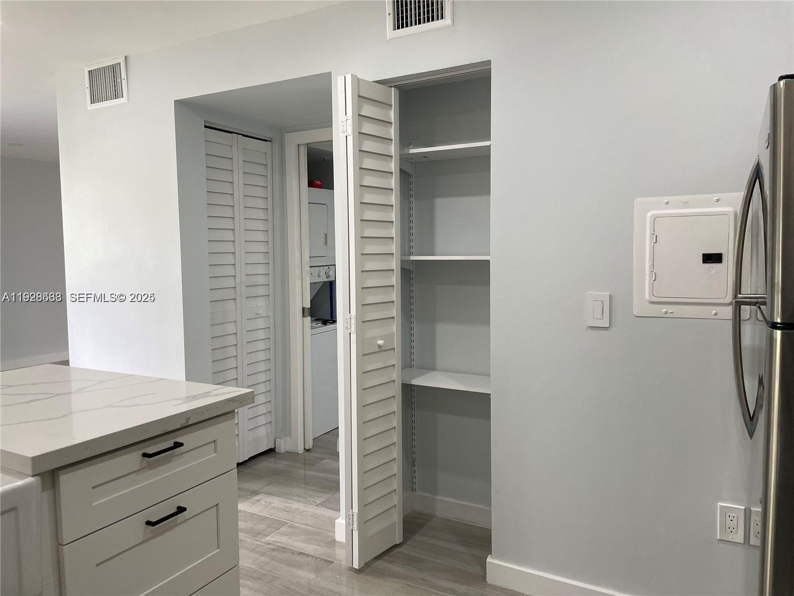2031 Renaissance Boulevard, Unit 101 Miramar, FL 33025 - Photo 6 of 23 a view of walk in closet