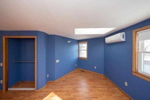 2 Teconnett Path Worcester, MA 01605 - Photo 11 of 36 an empty room with windows and closet