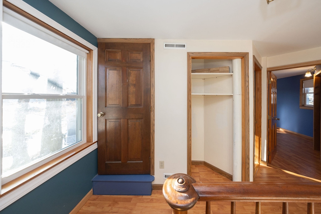 2 Teconnett Path Worcester, MA 01605 - Photo 24 of 36 a living room with wooden floor and furniture