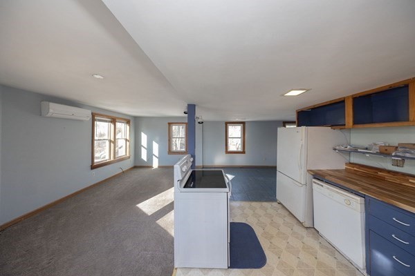 2 Teconnett Path Worcester, MA 01605 - Photo 4 of 36 a kitchen with granite countertop a refrigerator stove and sink
