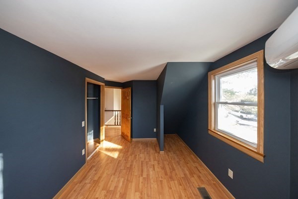 2 Teconnett Path Worcester, MA 01605 - Photo 10 of 36 a view of empty room with wooden floor and fan