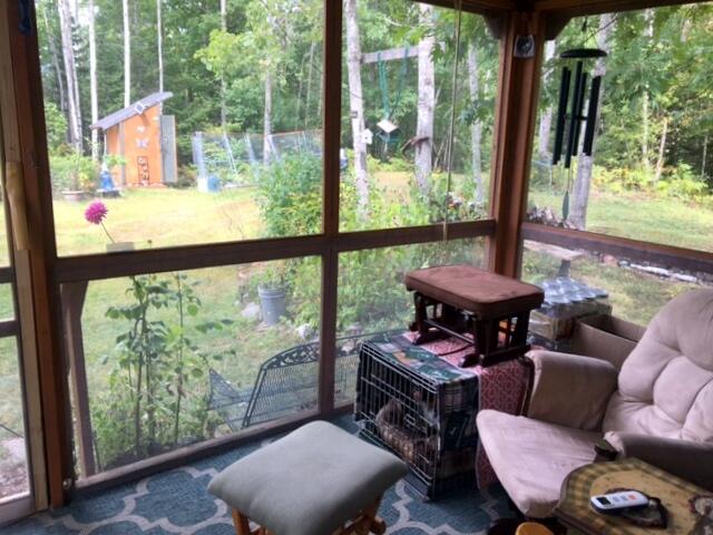 147 Whitaker Road Troy, ME 04987 - Photo 2 of 23 Screened in porch