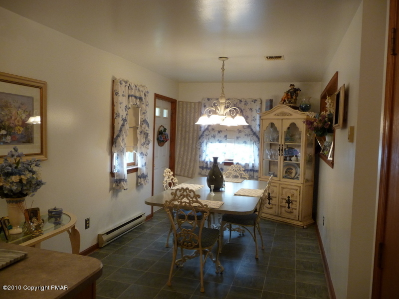 9 Old Stagecoach Road Gilbert, PA 18331 - Photo 8 of 12 a view of a dining room with furniture