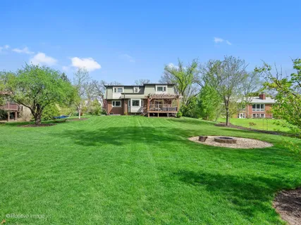 a view of a house with a big yard