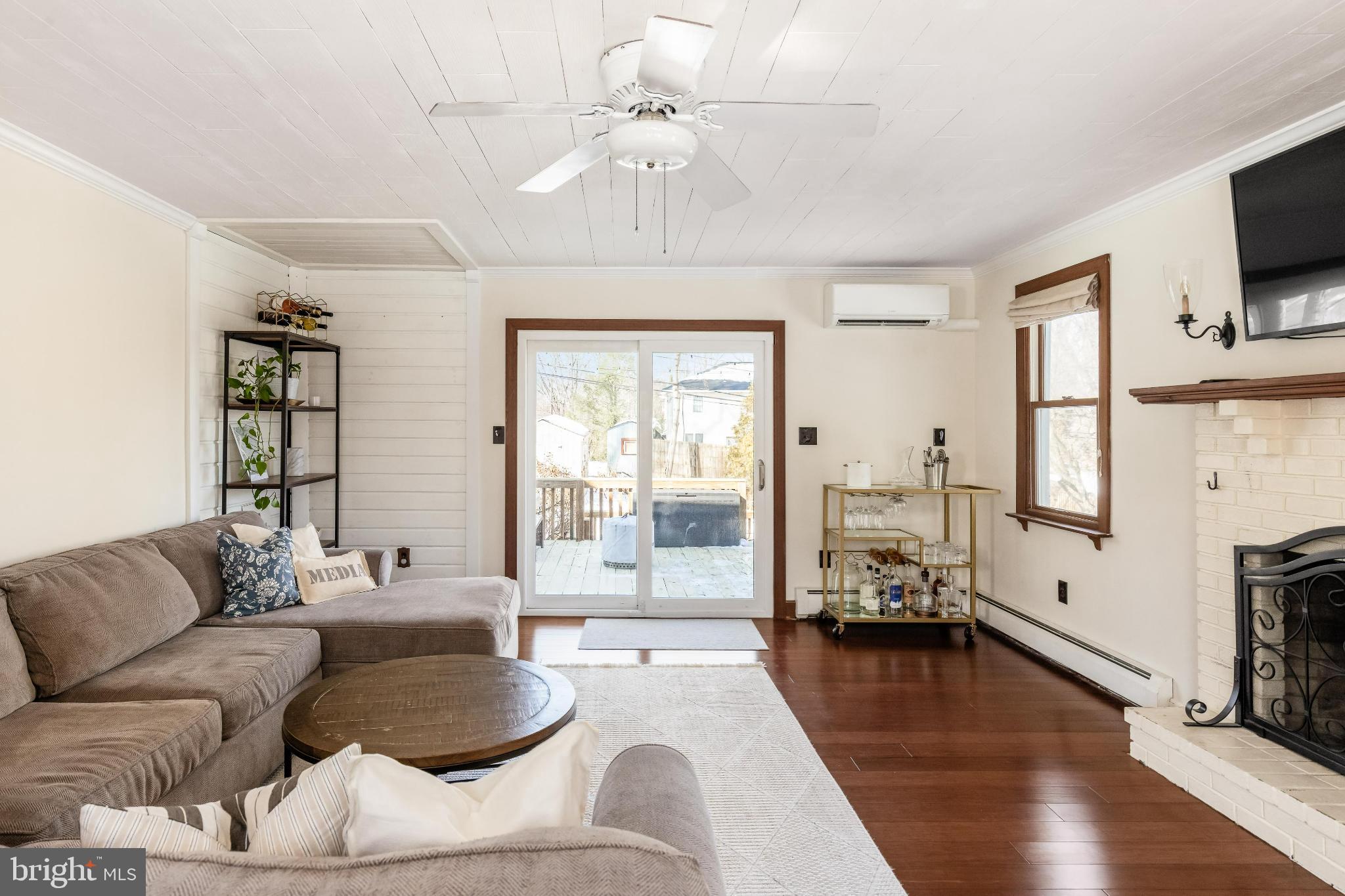 531 Gilbert Street Media, PA 19063 - Photo 11 of 45 a living room with fireplace furniture and a flat screen tv