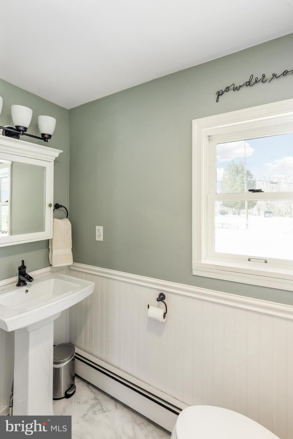 531 Gilbert Street Media, PA 19063 - Photo 25 of 45 a bathroom with a sink mirror and a toilet