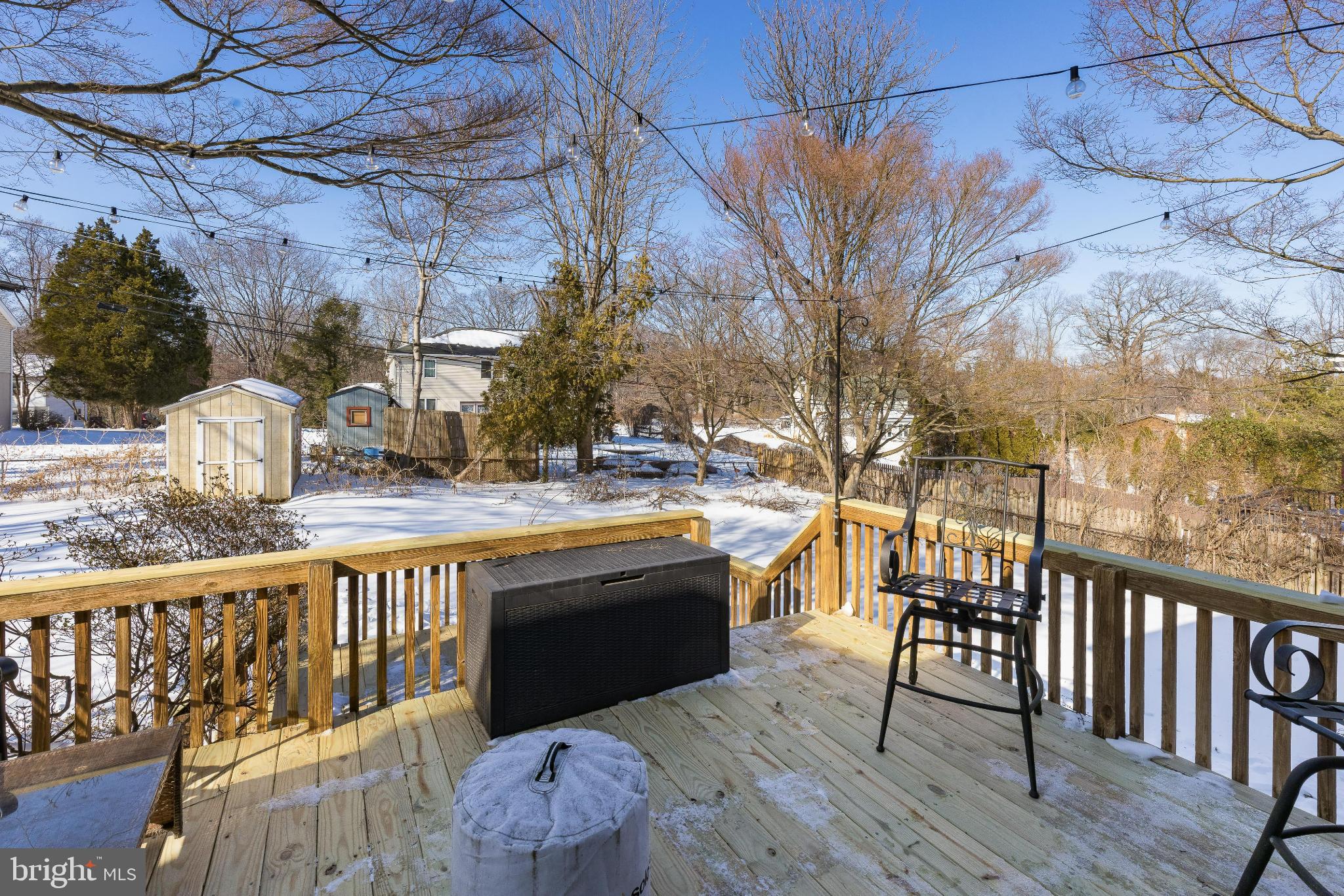 531 Gilbert Street Media, PA 19063 - Photo 43 of 45 a view of a roof deck with table and chairs a barbeque with wooden floor and fence