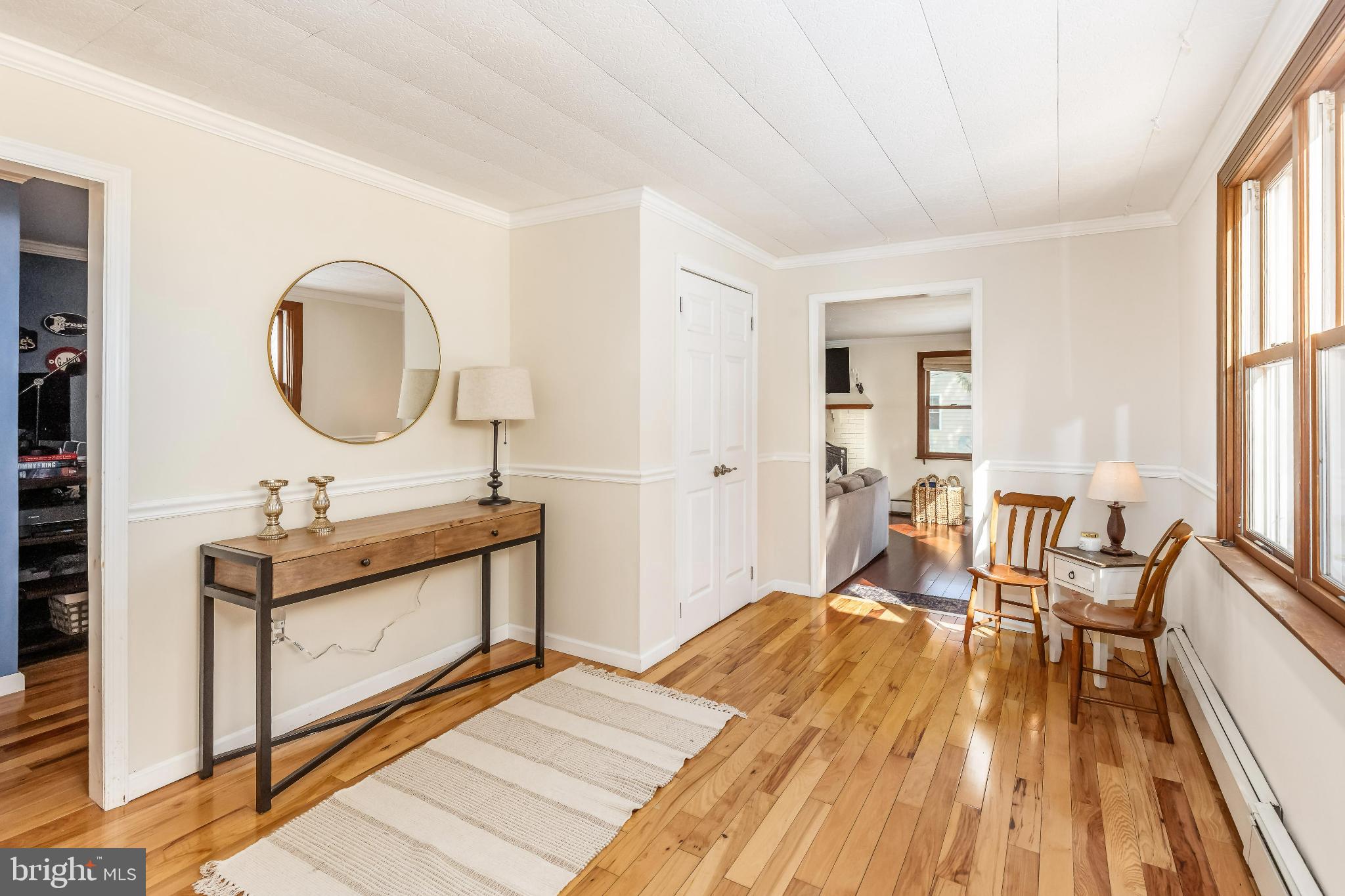 531 Gilbert Street Media, PA 19063 - Photo 6 of 45 a bedroom with a bed a mirror and a window