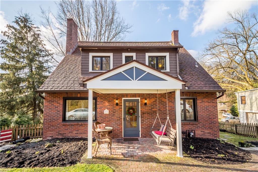 105 Fahnestock Road Pittsburgh, PA 15215 - Photo 1 of 20 a front view of a house with garden