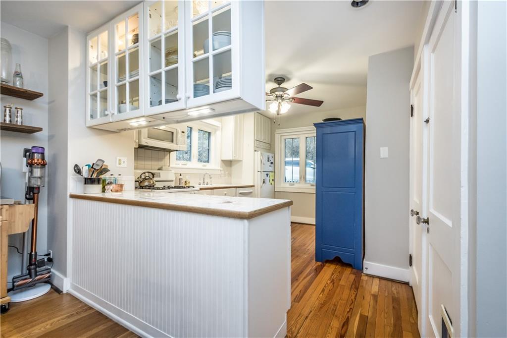 105 Fahnestock Road Pittsburgh, PA 15215 - Photo 12 of 20 a view of kitchen with refrigerator and cabinets