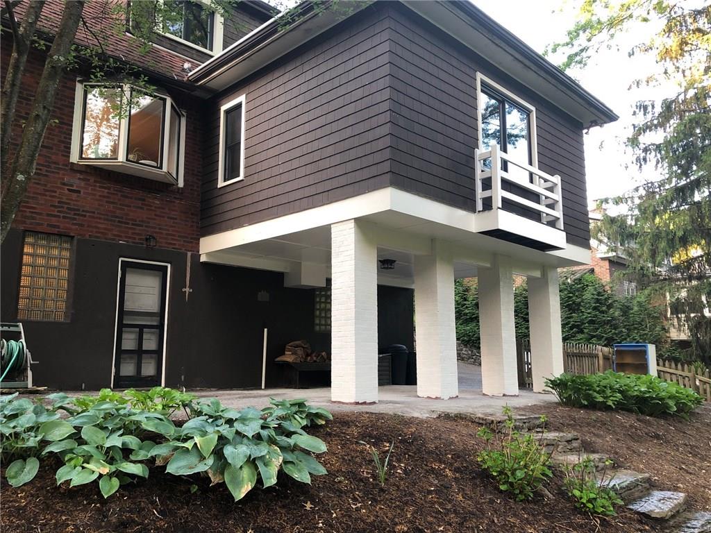 105 Fahnestock Road Pittsburgh, PA 15215 - Photo 7 of 20 a view of a house with potted plants