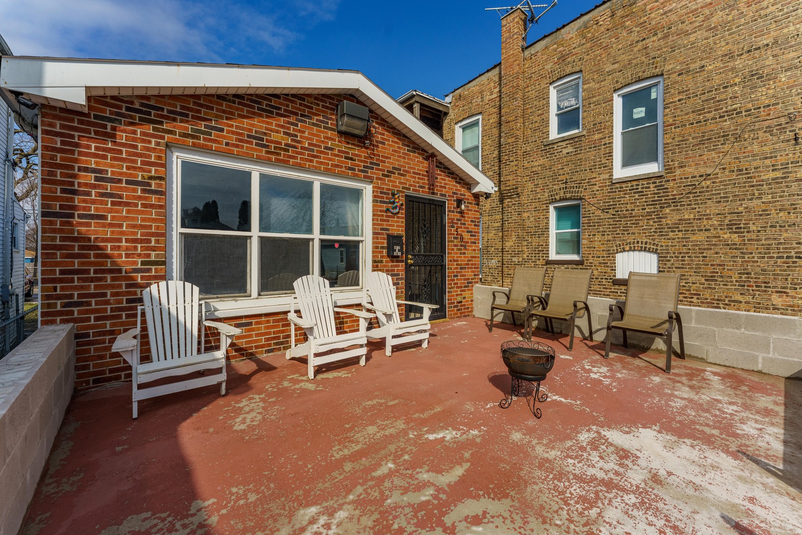 1504 West 71st Street Chicago, IL 60636 - Photo 1 of 1 a view of a patio with couple of chairs and a couch