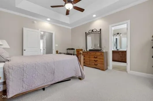 a bed room with a bed and a chandelier