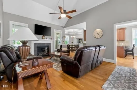 a living room with furniture and a lamp