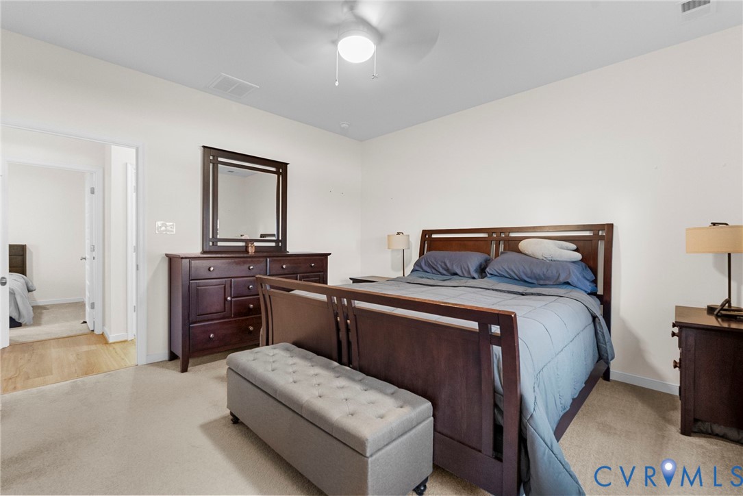 48 James Court Aylett, VA 23009 - Photo 18 of 30 a bedroom with a bed and a dresser