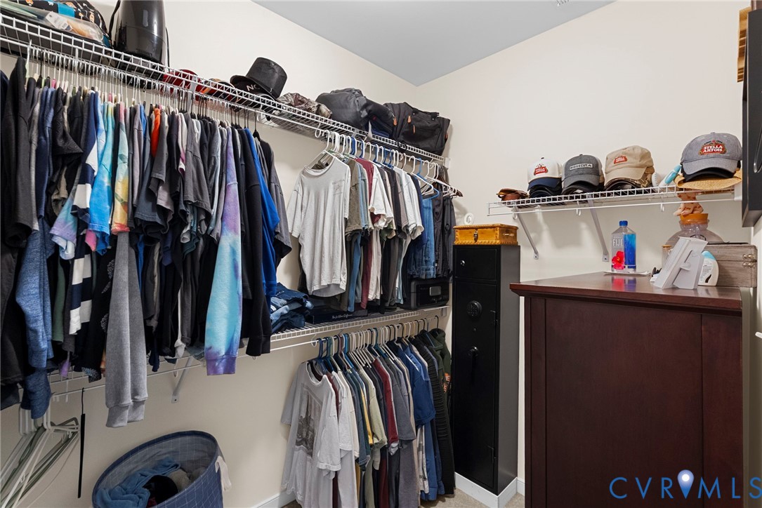 48 James Court Aylett, VA 23009 - Photo 19 of 30 a view of walk in closet with clothes and shoes