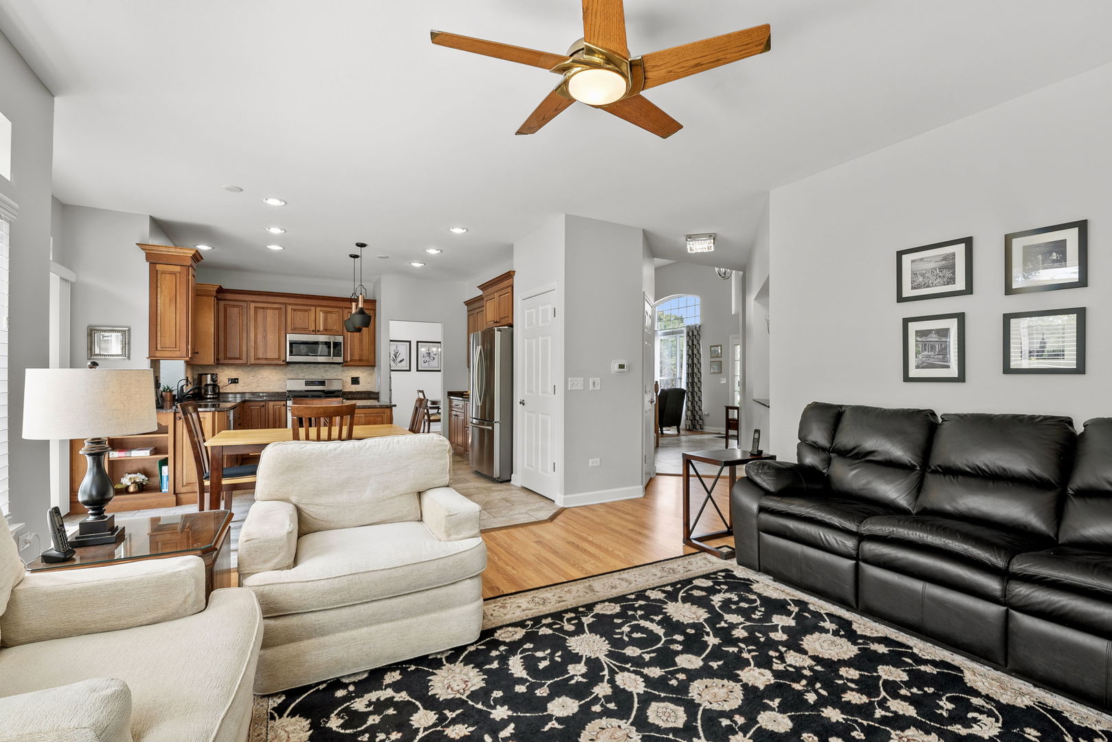 2011 Baldwin Way Bolingbrook, IL 60490 - Photo 9 of 21 a living room with furniture and a chandelier