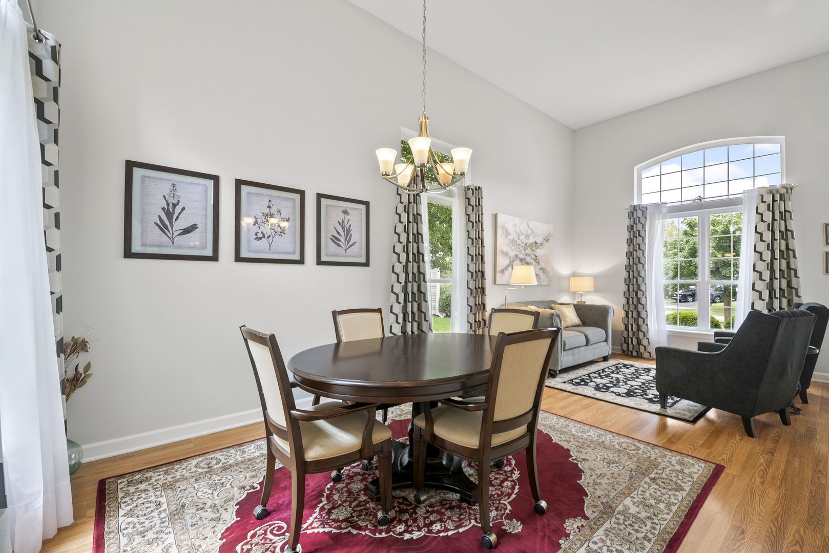2011 Baldwin Way Bolingbrook, IL 60490 - Photo 10 of 21 a dining room with furniture a rug and a chandelier