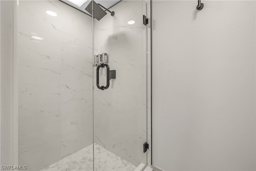 16650 Partridge Place Road, Unit 201 Fort Myers, FL 33908 - Photo 20 of 32 a bathroom with a shower