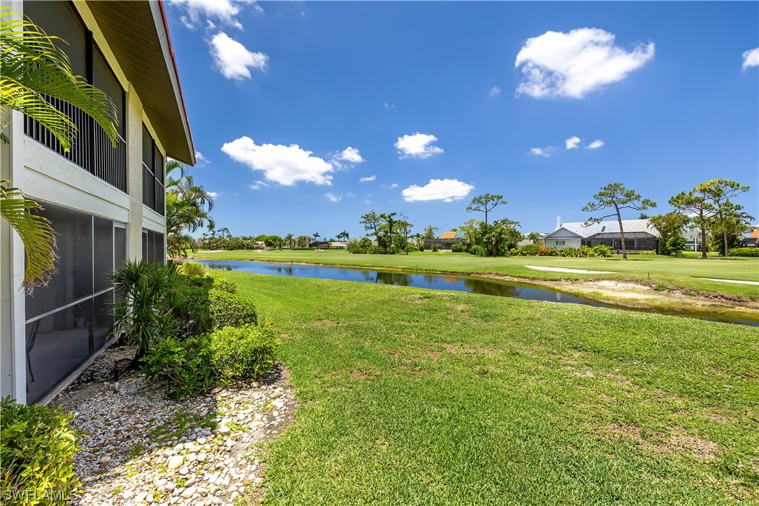 16650 Partridge Place Road, Unit 201 Fort Myers, FL 33908 - Photo 30 of 32 a view of a golf course with a swimming pool