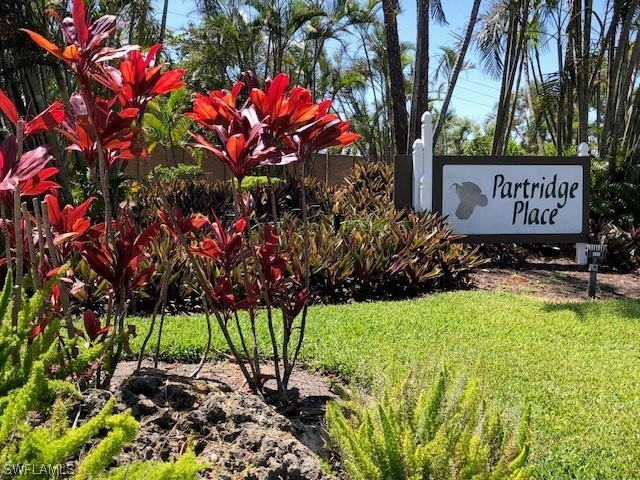 16650 Partridge Place Road, Unit 201 Fort Myers, FL 33908 - Photo 32 of 32 a view of a bunch of flowers and trees