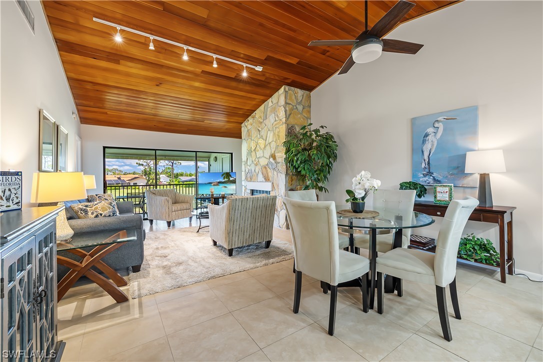 16650 Partridge Place Road, Unit 201 Fort Myers, FL 33908 - Photo 9 of 32 a view of a dining room with furniture