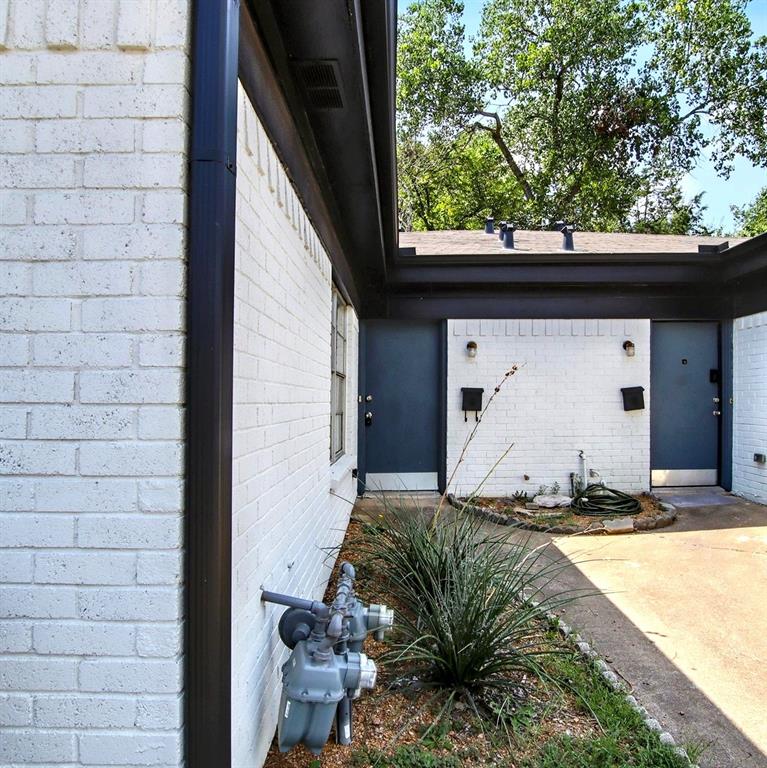 5354 Wonder Drive Fort Worth, TX 76133 - Photo 1 of 10 a front view of a house with a yard