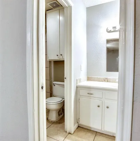 a bathroom with a sink and a toilet