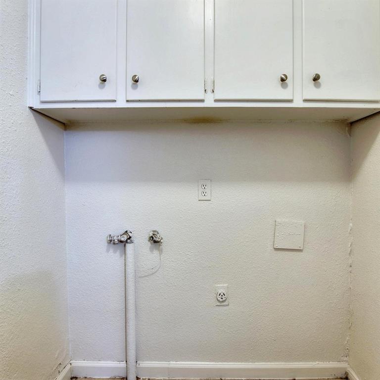 5354 Wonder Drive Fort Worth, TX 76133 - Photo 9 of 10 a close up of a cabinet