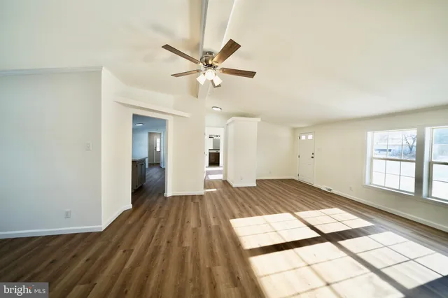 a view of an empty room and window