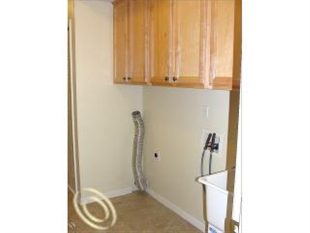 1843 Flagstone Circle Rochester, MI 48307 - Photo 7 of 20 Laundry is located right off the kitchen