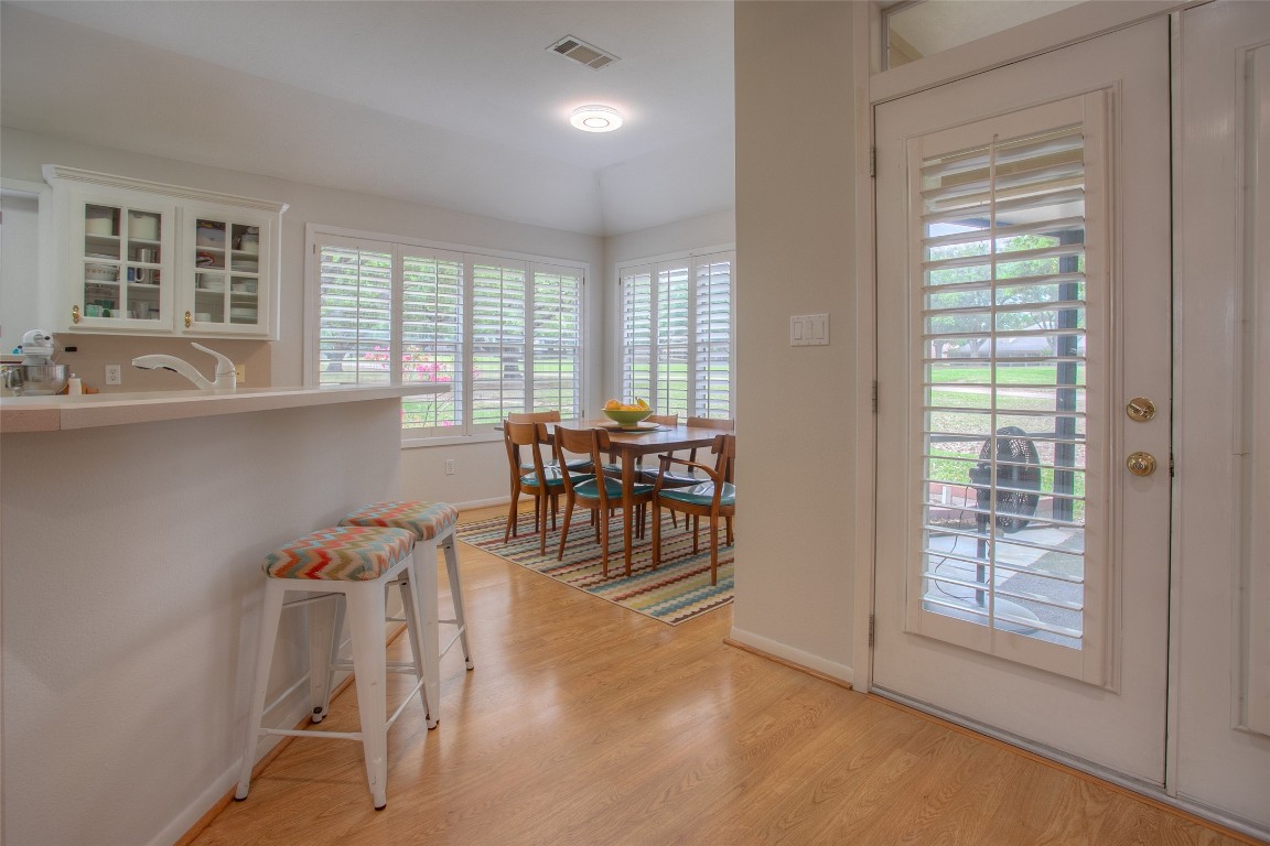 134 Waters Edge Huntsville, TX 77340 - Photo 21 of 38 a view of a dining room with furniture window and outside view