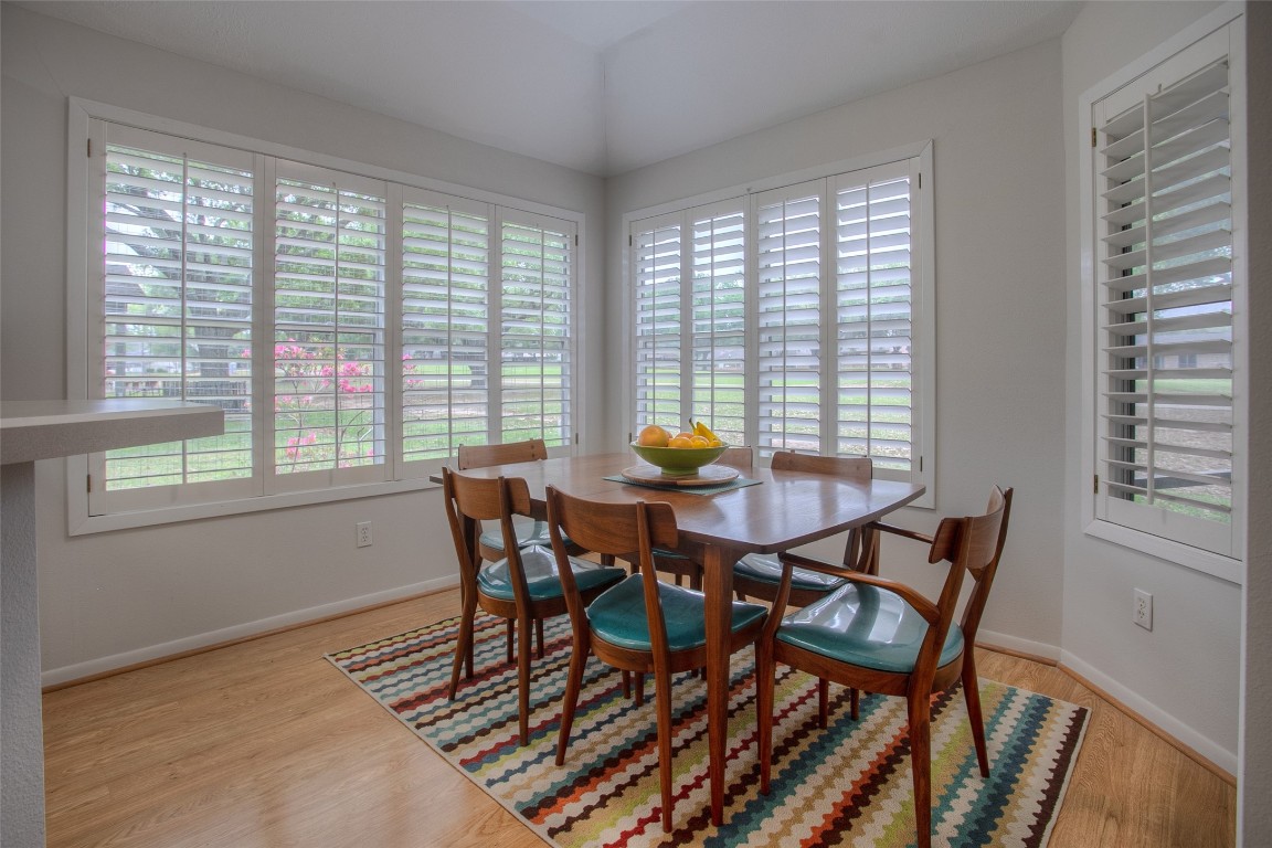 134 Waters Edge Huntsville, TX 77340 - Photo 22 of 38 a view of a dining room with furniture and window