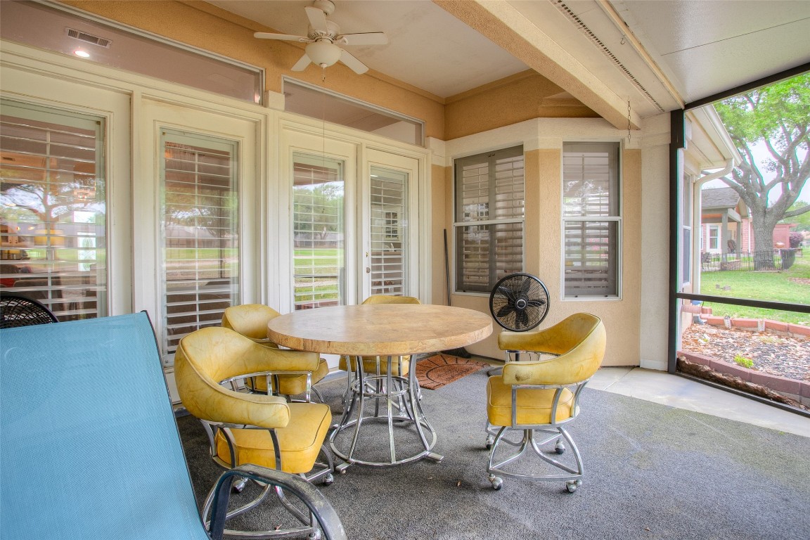 134 Waters Edge Huntsville, TX 77340 - Photo 10 of 38 a view of a room with a table and chairs