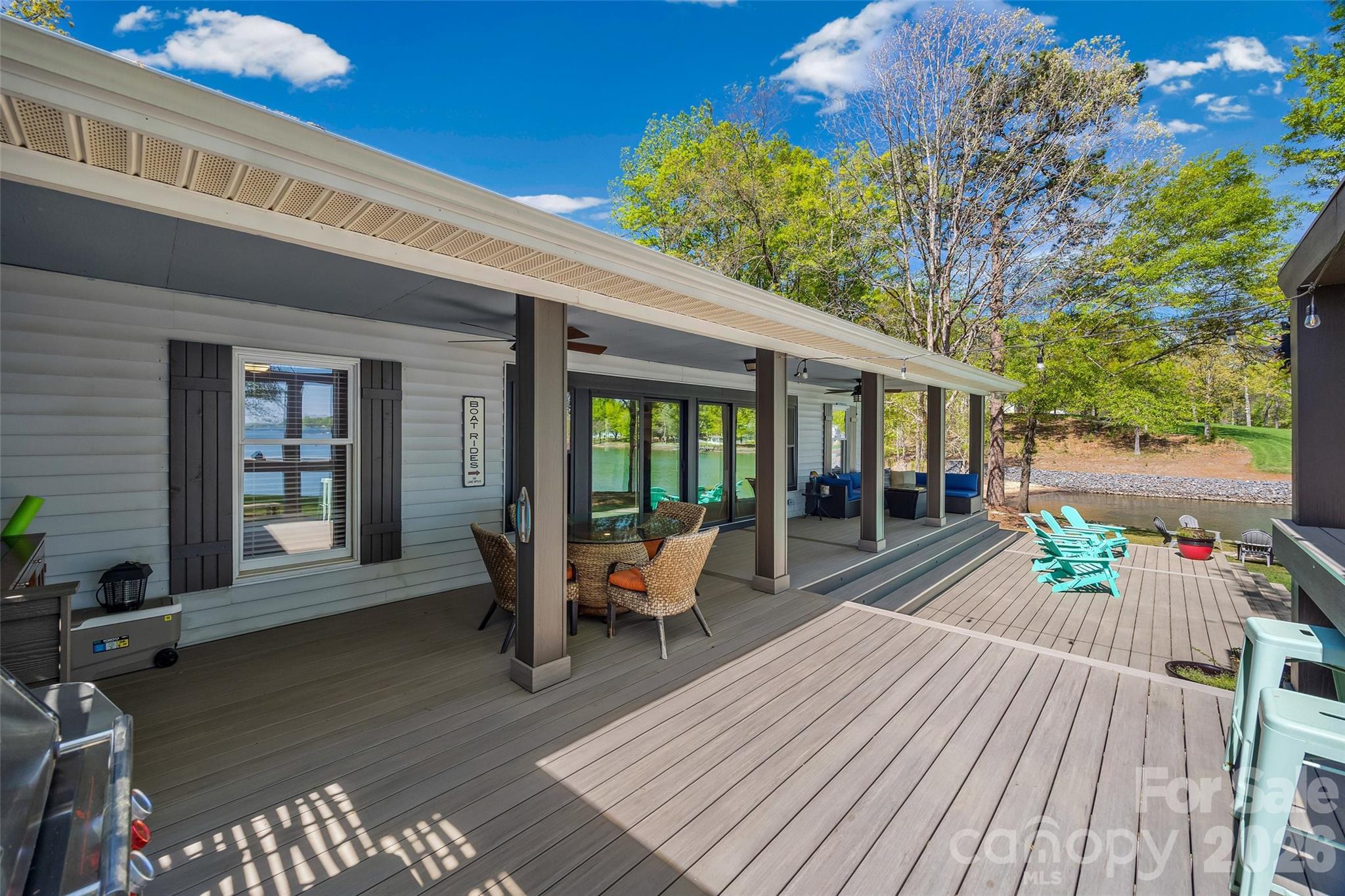 5280 Masons Ferry Road Clover, SC 29710 - Photo 31 of 45 a view of a patio with table and chairs and wooden floor