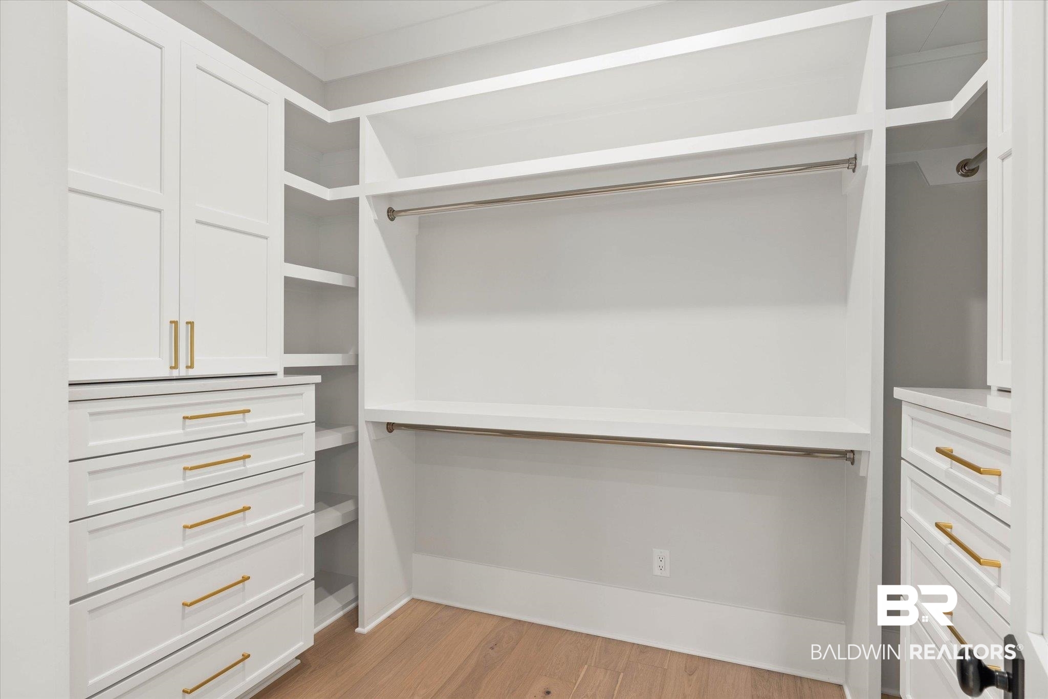 853 Inlet Circle Gulf Shores, AL 36542 - Photo 24 of 55 Walk in closet with wood finished floors