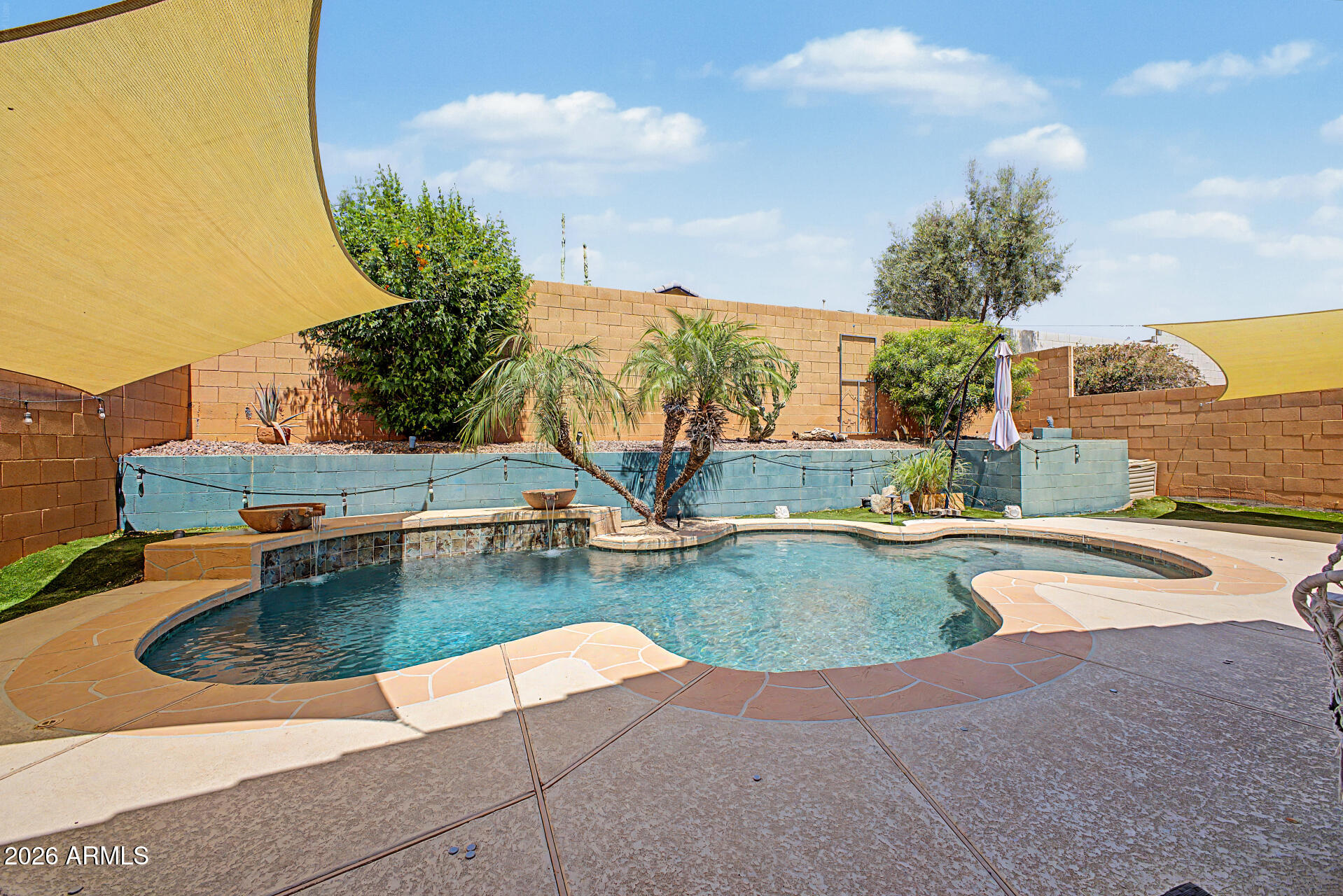 21052 West White Rock Road Buckeye, AZ 85396 - Photo 39 of 52 Backyard space with pool