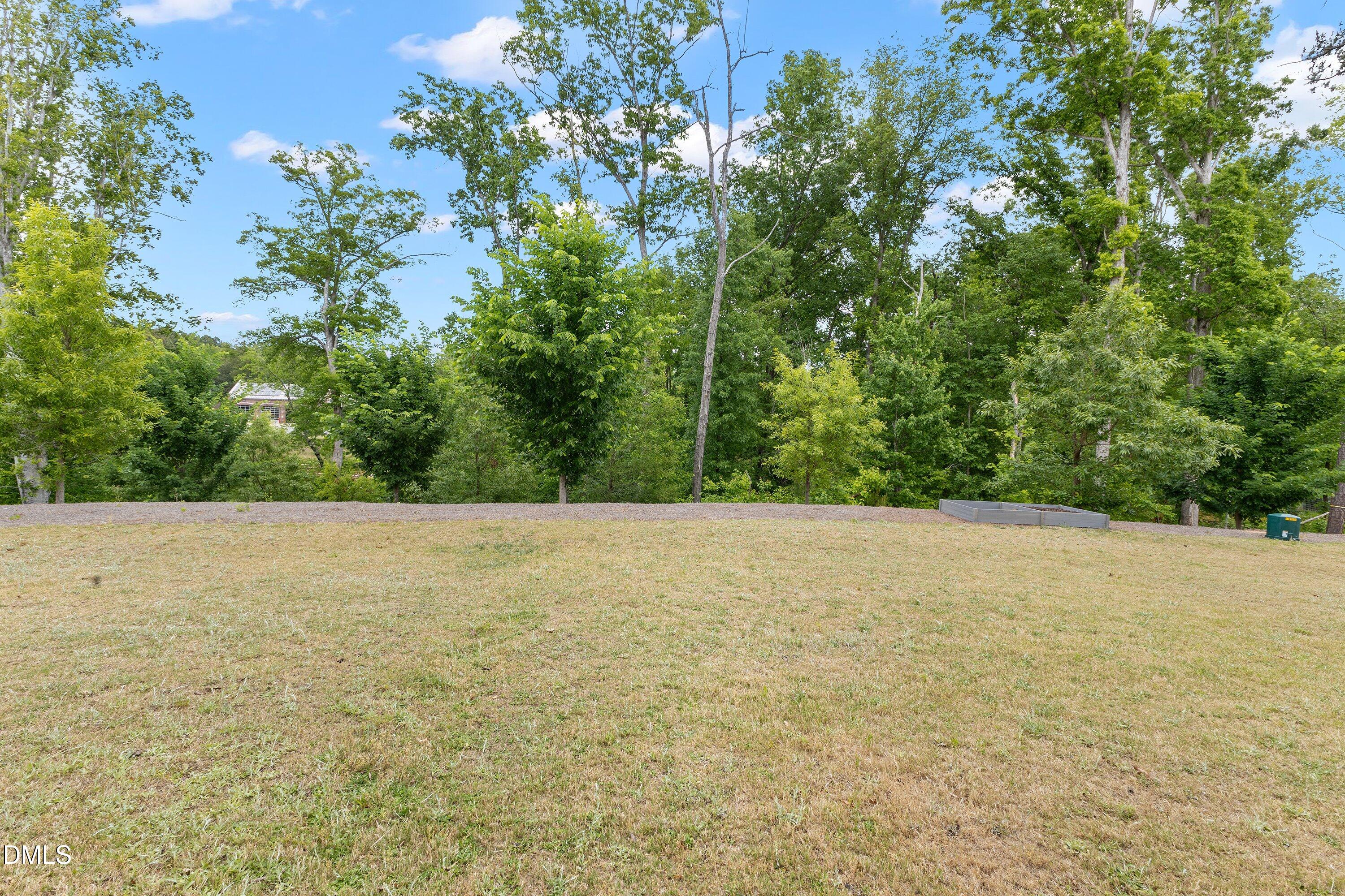 156 Sears Ridge Lane Morrisville, NC 27560 - Photo 38 of 49 a view of an outdoor space and a yard