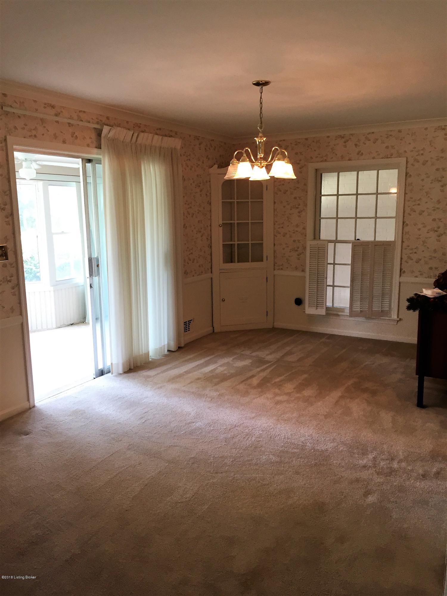 3506 Lexington Road Louisville, KY 40207 - Photo 6 of 27 Sunroom entrance from dining area.