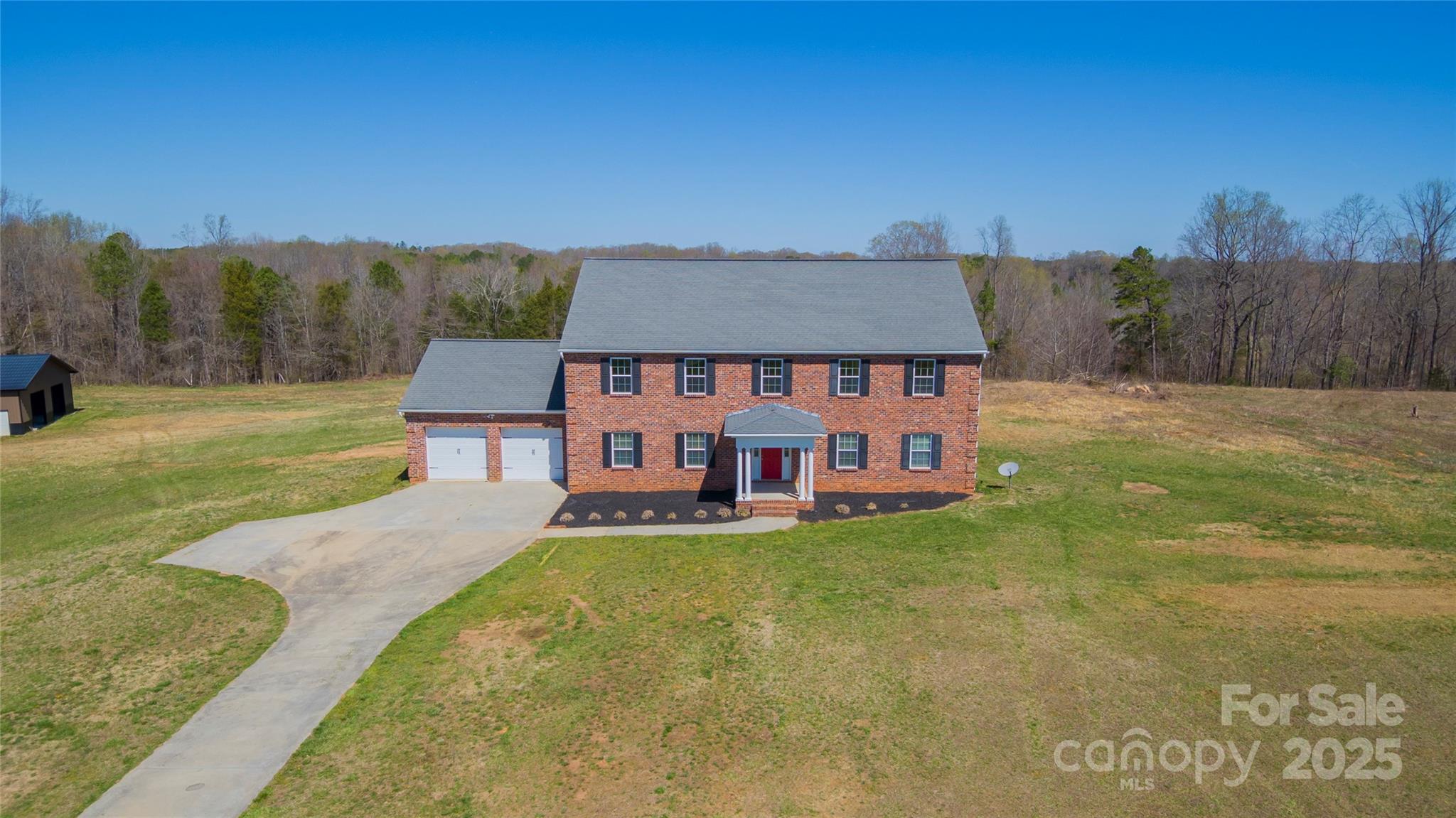 2536 Tyro Road Lexington, NC 27295 - Photo 2 of 31 a front view of a house with a big yard