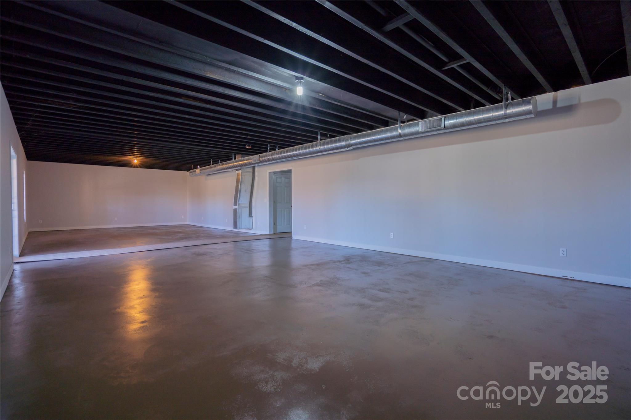 2536 Tyro Road Lexington, NC 27295 - Photo 22 of 31 a view of empty room with wooden floor