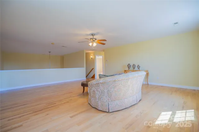 a living room with a table and a couch