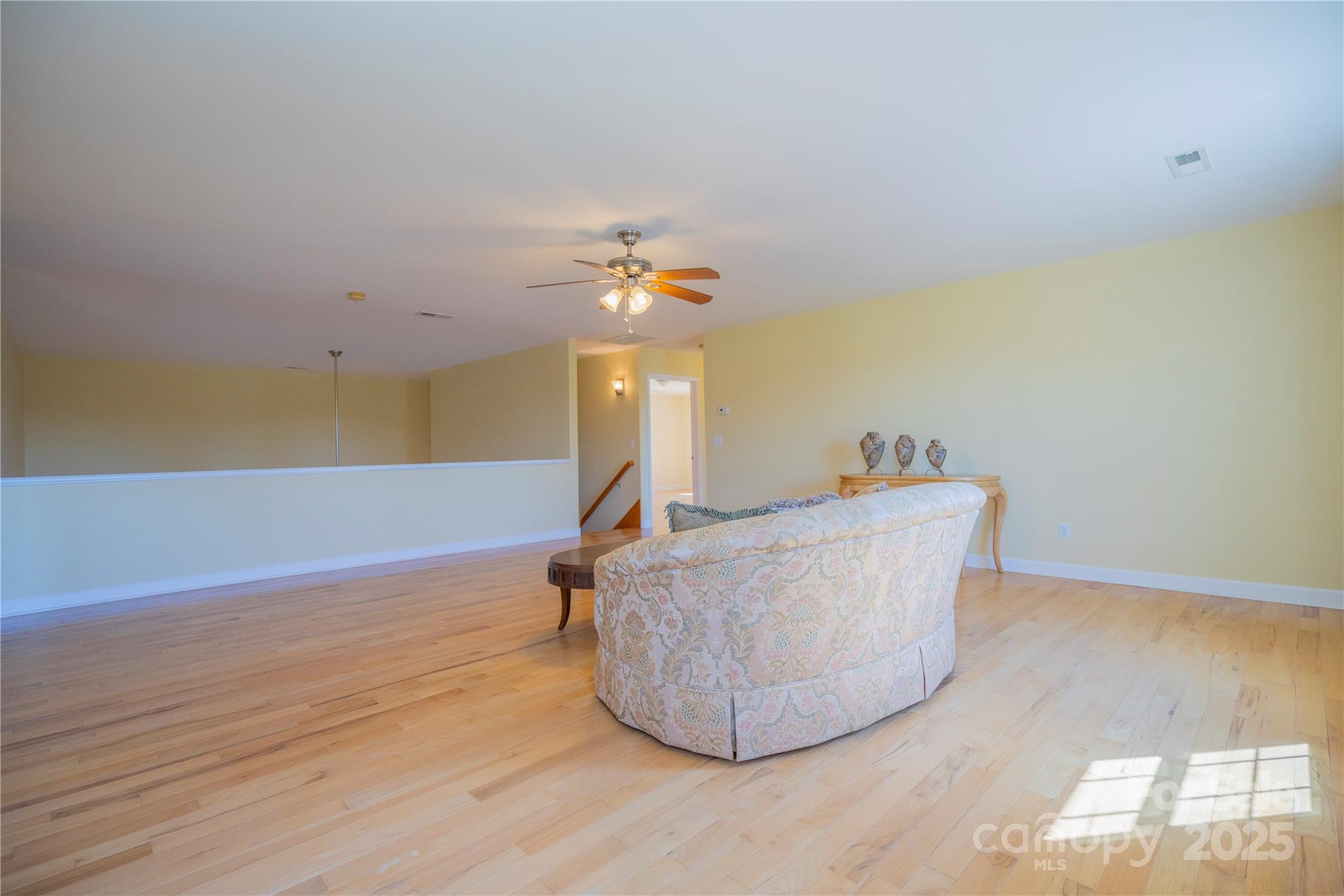 2536 Tyro Road Lexington, NC 27295 - Photo 9 of 31 a living room with a table and a couch