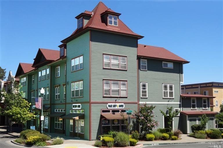234 Windsor River Road Windsor, CA 95492 - Photo 1 of 1 a front view of a residential apartment building with a yard