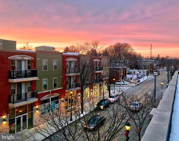 a view of a lake with a building in the background