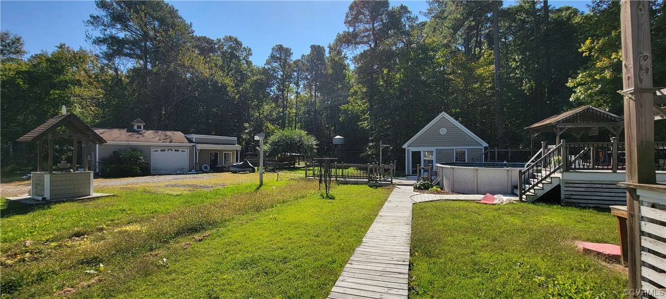 3502 Goodwin Neck Road Yorktown, VA 23692 - Photo 12 of 23 a swimming pool with porch and furniture