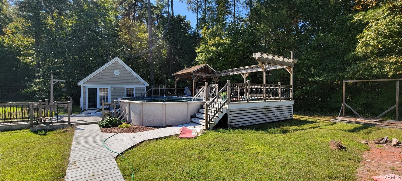 3502 Goodwin Neck Road Yorktown, VA 23692 - Photo 13 of 23 a front view of a house with a garden