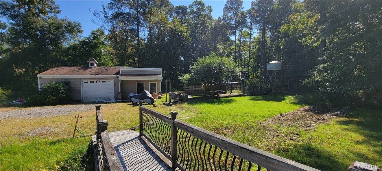 3502 Goodwin Neck Road Yorktown, VA 23692 - Photo 14 of 23 a view of a house with backyard and sitting area