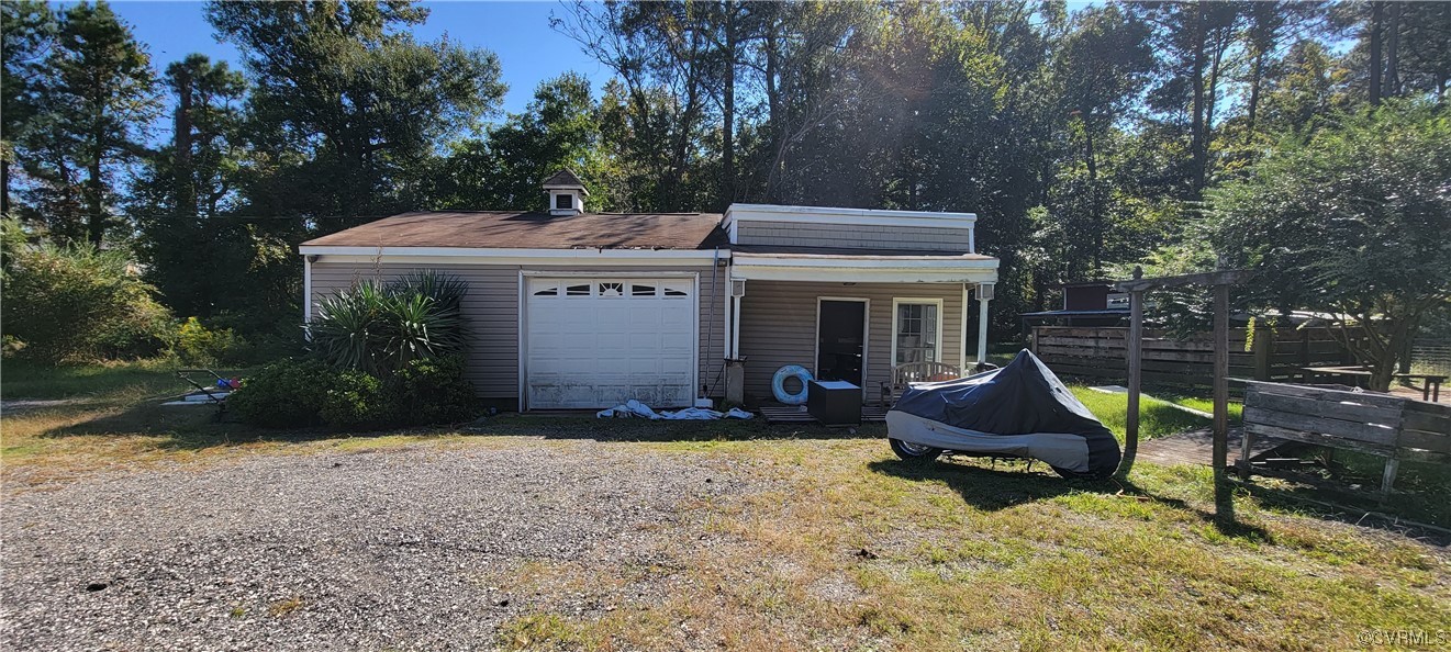3502 Goodwin Neck Road Yorktown, VA 23692 - Photo 16 of 23 a view of a house with backyard tub and sitting area