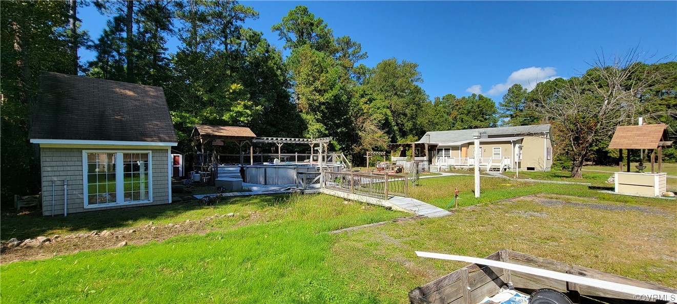 3502 Goodwin Neck Road Yorktown, VA 23692 - Photo 17 of 23 a view of a house with swimming pool and sitting area